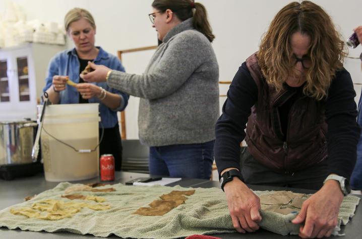 students work with fabrics